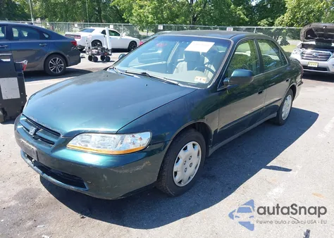 1999 Honda Accord Lx from USA, damaged, VIN 1HGCG6656XA110717
